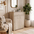 Un espace mieux organise grace a ce buffet avec tiroirs, aux accents metalliques, finition blanc et naturel